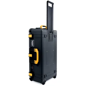 Black Pelican 1615 case with yellow handles and latches. No Foam. With Wheels.